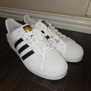 Adidas Superstar Men's White and Black Sneakers
