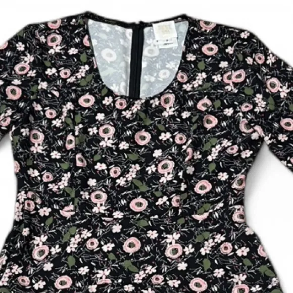 Anna Sui A- Line 3/4 sleeve dress, size 2. Black with floral pattern. Bohemian