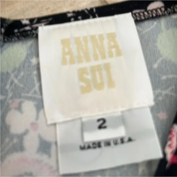 Anna Sui A- Line 3/4 sleeve dress, size 2. Black with floral pattern. Bohemian