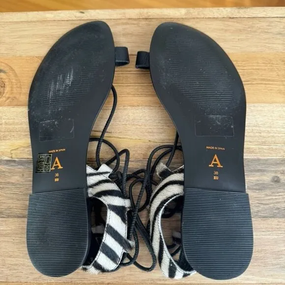 Anthropologie Black Leather Zebra Print Calf Hair Thong Angle Wrap Flat Sandal
