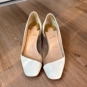 Christian Louboutin White Heels with Elegant Design
