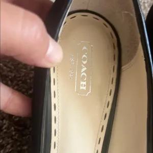 Coach Black Platform Shoes with Signature Stitching