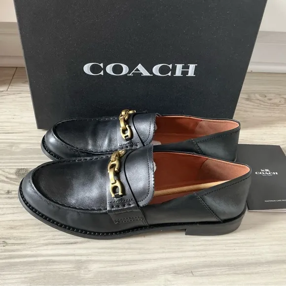 Coach women’s Putnam loafer black leather Sz 9 metal gold chain slip on shoes
