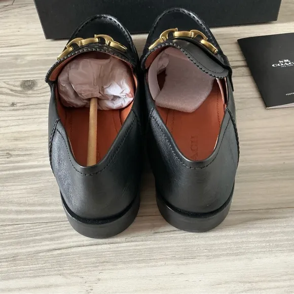 Coach women’s Putnam loafer black leather Sz 9 metal gold chain slip on shoes