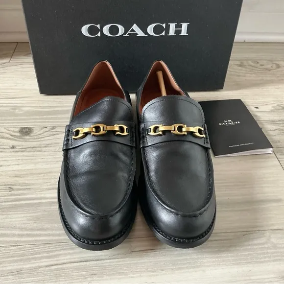 Coach women’s Putnam loafer black leather Sz 9 metal gold chain slip on shoes