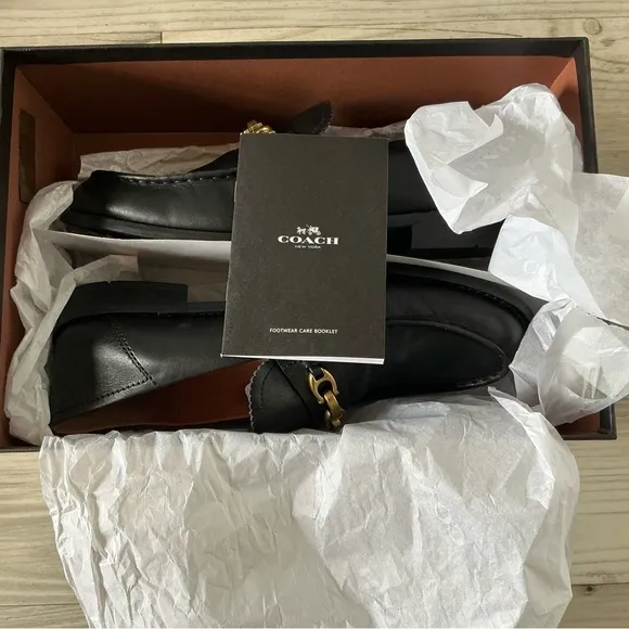 Coach women’s Putnam loafer black leather Sz 9 metal gold chain slip on shoes