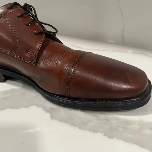 Floresheim men's brown leather dress shoes size 10.5 D. Please see wear.