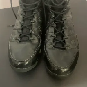 Jordan Black High-Top Athletic Sneakers with Minimalist Design