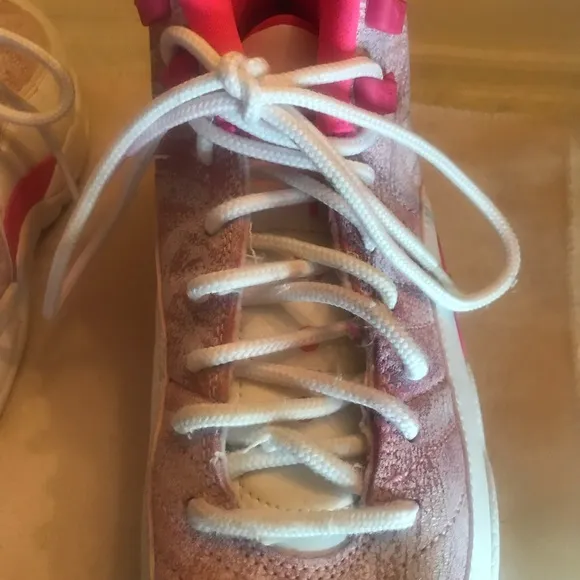 Jordan Pink and White Sneakers with Retro Style