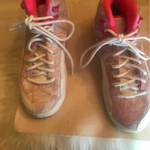 Jordan Pink and White Sneakers with Retro Style