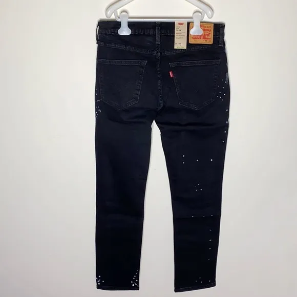 Levi’s 511 slim fit paint splatter black jeans size w32 x l32