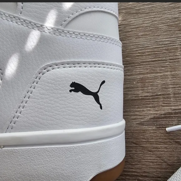 Puma Men's White and Black High-Top Sneakers