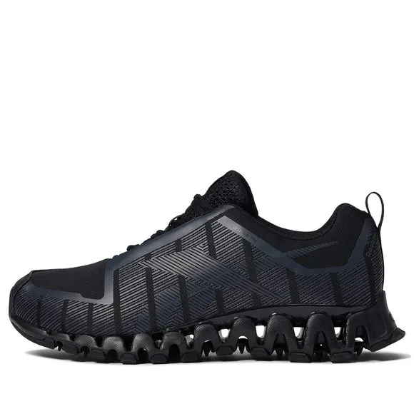 REEBOK MENS ZIGWILD TR 6 SNEAKER, BLACK/COLD GREY/WHITE, 10.5 US
