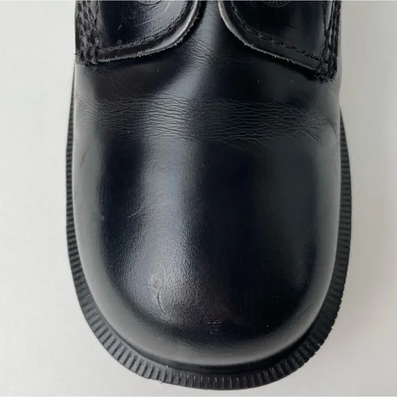 Vintage Dr. Martens Black Boots with Smooth Leather and Lace-Up Design