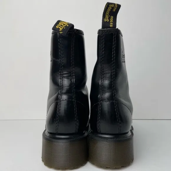 Vintage Dr. Martens Black Boots with Smooth Leather and Lace-Up Design